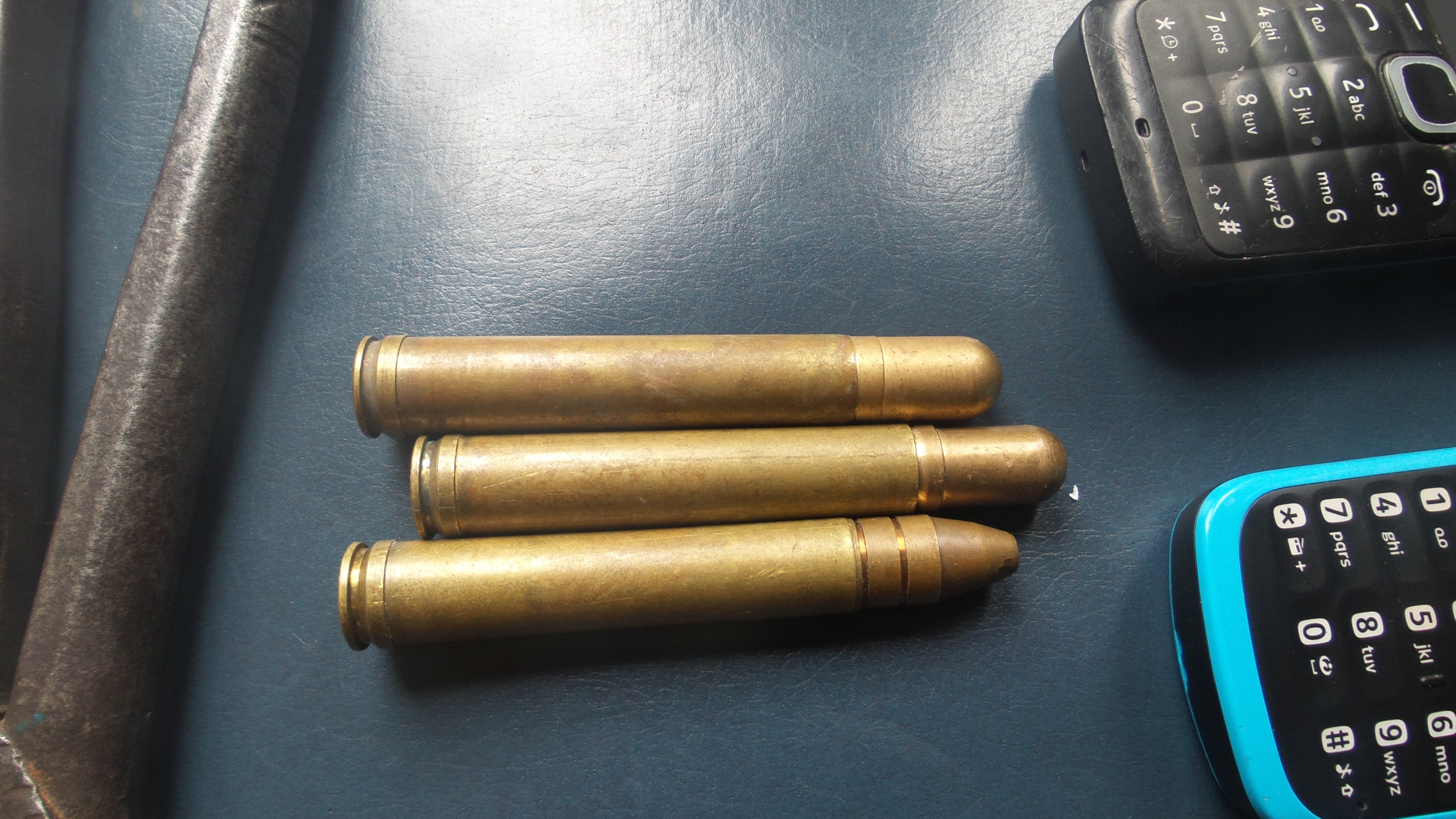 High-caliber bullets, cell phones and machete recovered from rhino poaching crime scene